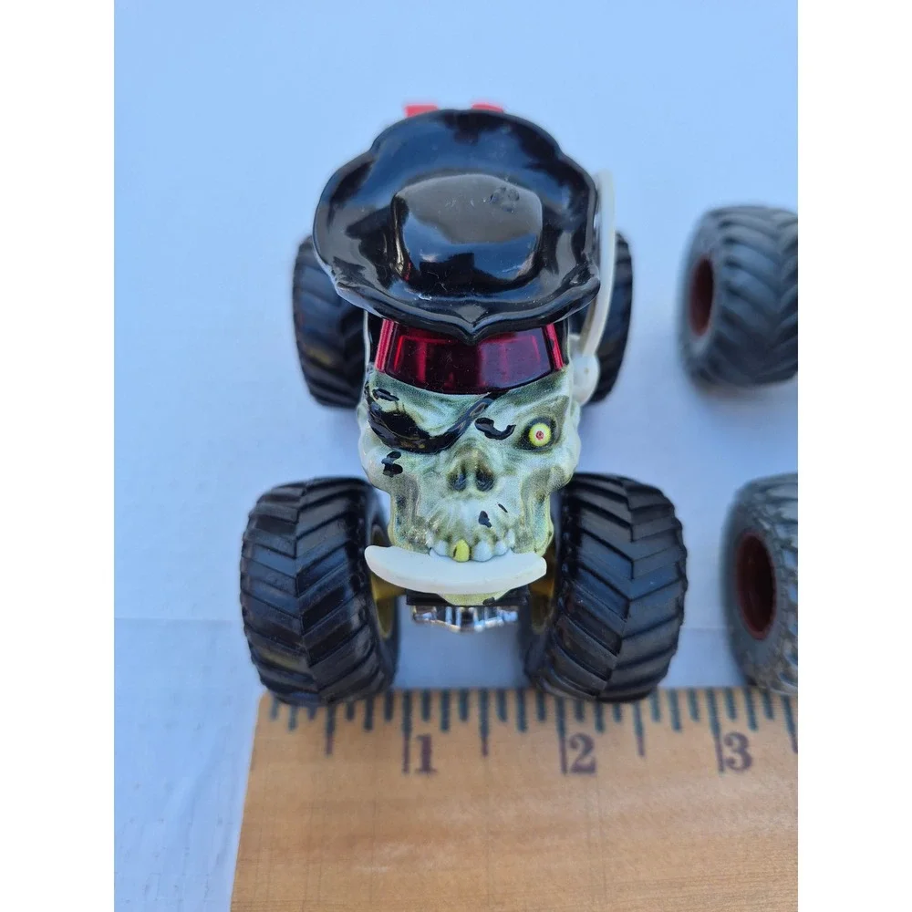 Monster Jam Pirates Curse and Zombie vs Hunter Earth Shaker Die-Cast Truck Lot